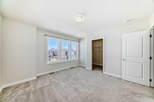 105 Creekside Way Sw, Calgary, AB - Indoor Photo Showing Other Room
