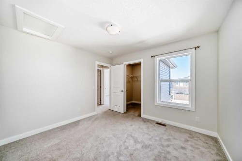 105 Creekside Way Sw, Calgary, AB - Indoor Photo Showing Other Room