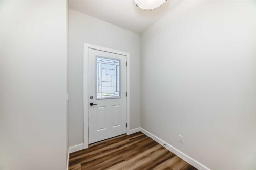 105 Creekside Way Sw, Calgary, AB - Indoor Photo Showing Other Room