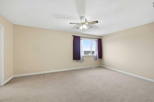 101 Panamount Manor Nw, Calgary, AB - Indoor Photo Showing Other Room