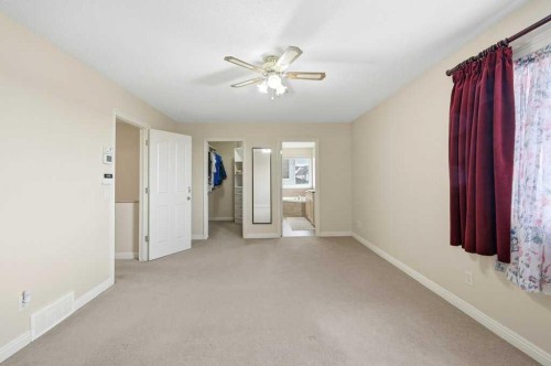 101 Panamount Manor Nw, Calgary, AB - Indoor Photo Showing Other Room