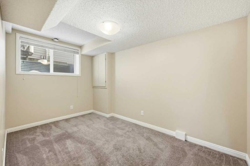101 Panamount Manor Nw, Calgary, AB - Indoor Photo Showing Other Room
