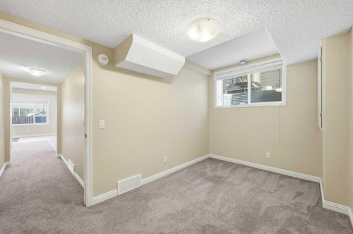 101 Panamount Manor Nw, Calgary, AB - Indoor Photo Showing Other Room