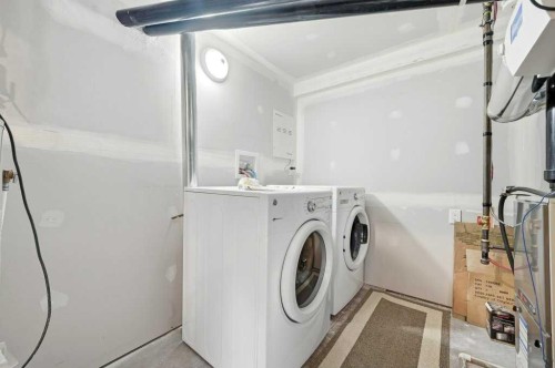 101 Panamount Manor Nw, Calgary, AB - Indoor Photo Showing Laundry Room