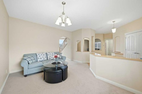 101 Panamount Manor Nw, Calgary, AB - Indoor Photo Showing Living Room