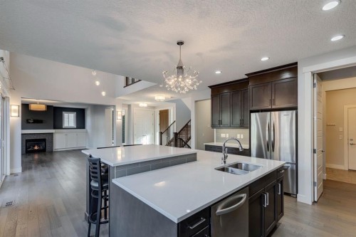 427 Canals Boulevard Sw, Airdrie, AB - Indoor Photo Showing Kitchen With Double Sink With Upgraded Kitchen