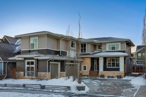 427 Canals Boulevard Sw, Airdrie, AB - Outdoor With Deck Patio Veranda With Facade