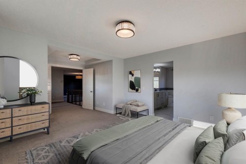 427 Canals Boulevard Sw, Airdrie, AB - Indoor Photo Showing Bedroom