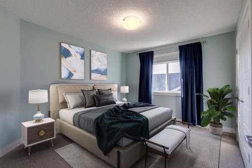 427 Canals Boulevard Sw, Airdrie, AB - Indoor Photo Showing Bedroom