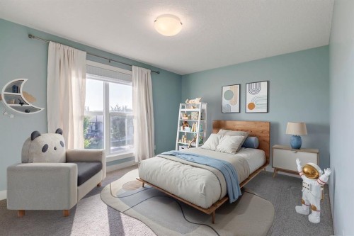 427 Canals Boulevard Sw, Airdrie, AB - Indoor Photo Showing Bedroom