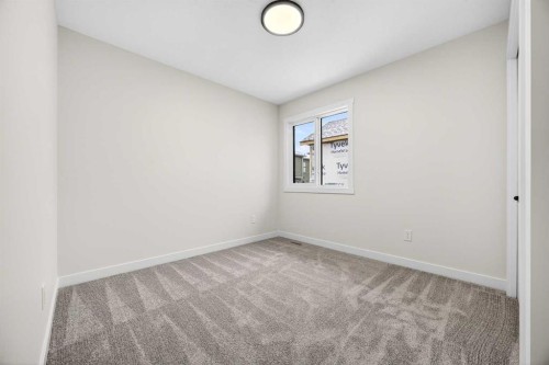 306 Alpine Boulevard, Calgary, AB - Indoor Photo Showing Other Room
