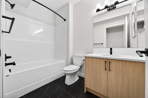 306 Alpine Boulevard, Calgary, AB - Indoor Photo Showing Bathroom