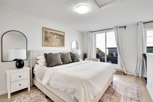 128 Cranbrook Square Se, Calgary, AB - Indoor Photo Showing Bedroom