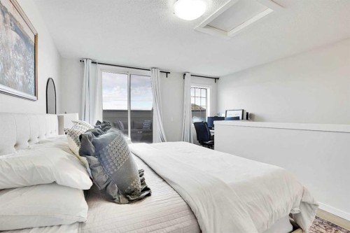 128 Cranbrook Square Se, Calgary, AB - Indoor Photo Showing Bedroom