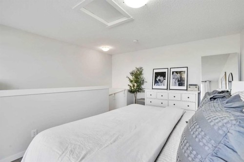128 Cranbrook Square Se, Calgary, AB - Indoor Photo Showing Bedroom