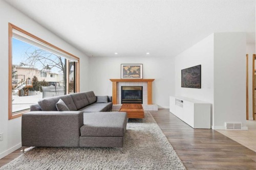 12 Citadel Close Nw, Calgary, AB - Indoor Photo Showing Living Room With Fireplace