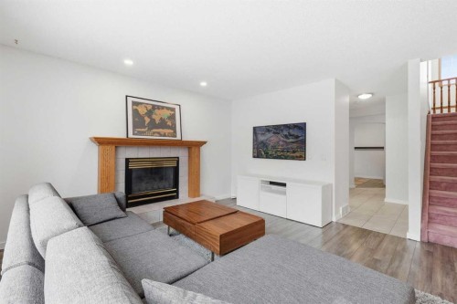 12 Citadel Close Nw, Calgary, AB - Indoor Photo Showing Living Room With Fireplace