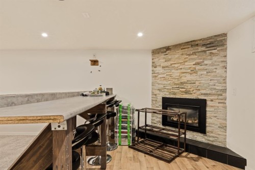 20 Calandar Road Nw, Calgary, AB - Indoor With Fireplace