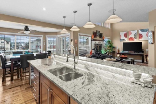 935 Bayside Drive Sw, Airdrie, AB - Indoor Photo Showing Kitchen With Double Sink