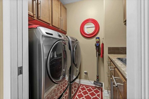 935 Bayside Drive Sw, Airdrie, AB - Indoor Photo Showing Laundry Room