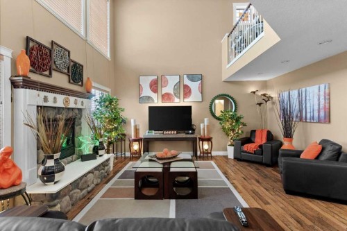 935 Bayside Drive Sw, Airdrie, AB - Indoor With Fireplace