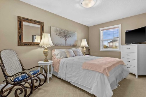 935 Bayside Drive Sw, Airdrie, AB - Indoor Photo Showing Bedroom