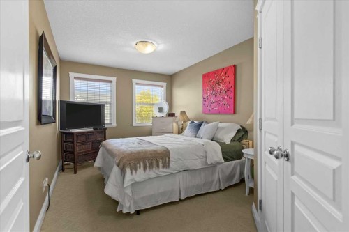 935 Bayside Drive Sw, Airdrie, AB - Indoor Photo Showing Bedroom