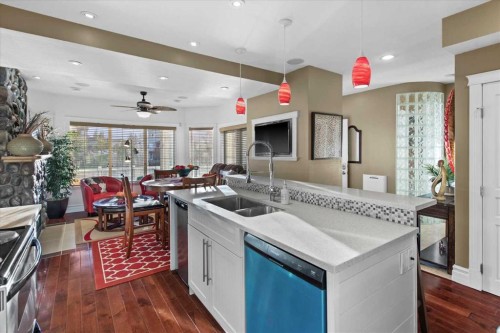 935 Bayside Drive Sw, Airdrie, AB - Indoor Photo Showing Kitchen With Double Sink
