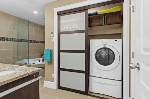 935 Bayside Drive Sw, Airdrie, AB - Indoor Photo Showing Laundry Room