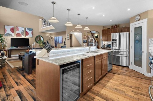 935 Bayside Drive Sw, Airdrie, AB - Indoor Photo Showing Kitchen With Upgraded Kitchen