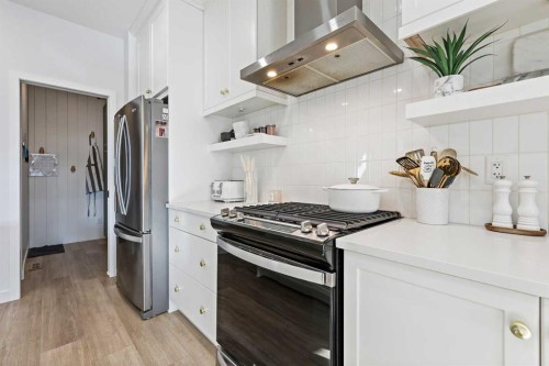 22 Wolf Creek Manor Se, Calgary, AB - Indoor Photo Showing Kitchen With Stainless Steel Kitchen With Upgraded Kitchen