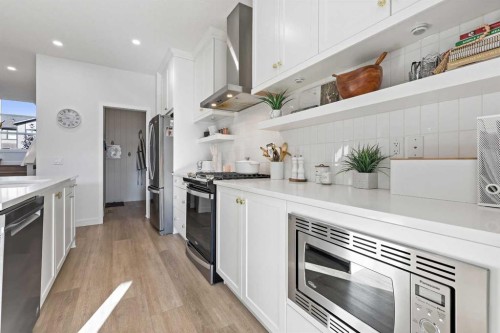 22 Wolf Creek Manor Se, Calgary, AB - Indoor Photo Showing Kitchen With Stainless Steel Kitchen With Upgraded Kitchen