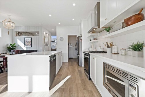 22 Wolf Creek Manor Se, Calgary, AB - Indoor Photo Showing Kitchen With Stainless Steel Kitchen With Upgraded Kitchen
