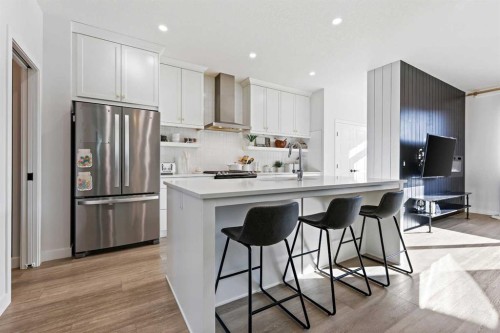 22 Wolf Creek Manor Se, Calgary, AB - Indoor Photo Showing Kitchen With Stainless Steel Kitchen