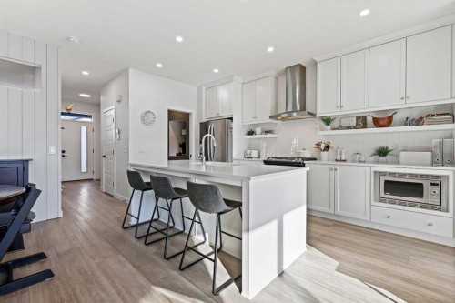 22 Wolf Creek Manor Se, Calgary, AB - Indoor Photo Showing Kitchen With Upgraded Kitchen