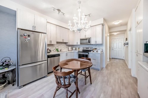 1118-298 Sage Meadows Park Nw, Calgary, AB - Indoor Photo Showing Kitchen With Stainless Steel Kitchen With Upgraded Kitchen