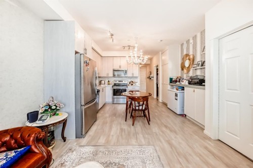 1118-298 Sage Meadows Park Nw, Calgary, AB - Indoor Photo Showing Kitchen With Stainless Steel Kitchen