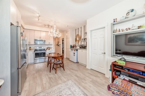 1118-298 Sage Meadows Park Nw, Calgary, AB - Indoor Photo Showing Kitchen With Stainless Steel Kitchen