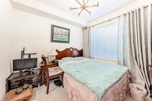 1118-298 Sage Meadows Park Nw, Calgary, AB - Indoor Photo Showing Bedroom