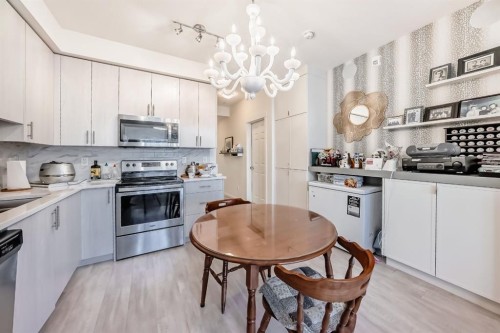 1118-298 Sage Meadows Park Nw, Calgary, AB - Indoor Photo Showing Kitchen With Stainless Steel Kitchen