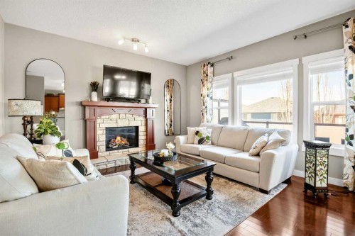 372 Evanspark Circle Nw, Calgary, AB - Indoor Photo Showing Living Room With Fireplace