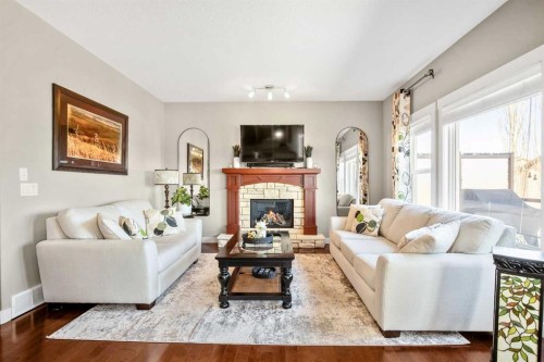 372 Evanspark Circle Nw, Calgary, AB - Indoor Photo Showing Living Room With Fireplace
