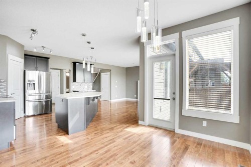 157 Rainbow Falls Boulevard, Chestermere, AB - Indoor Photo Showing Kitchen With Stainless Steel Kitchen With Upgraded Kitchen