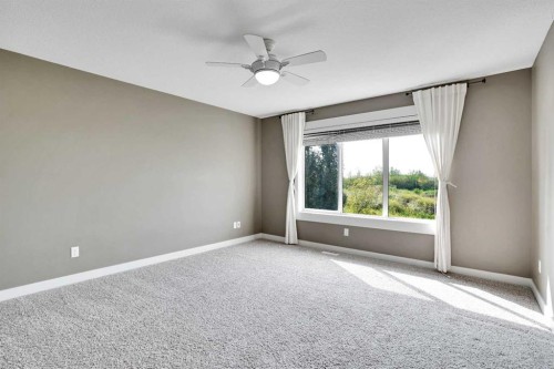 157 Rainbow Falls Boulevard, Chestermere, AB - Indoor Photo Showing Other Room
