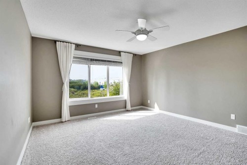 157 Rainbow Falls Boulevard, Chestermere, AB - Indoor Photo Showing Other Room