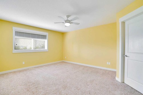157 Rainbow Falls Boulevard, Chestermere, AB - Indoor Photo Showing Other Room