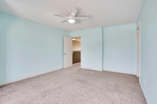 157 Rainbow Falls Boulevard, Chestermere, AB - Indoor Photo Showing Other Room