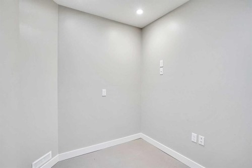 157 Rainbow Falls Boulevard, Chestermere, AB - Indoor Photo Showing Other Room