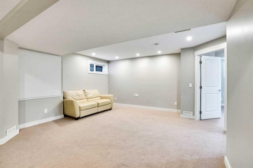 157 Rainbow Falls Boulevard, Chestermere, AB - Indoor Photo Showing Other Room