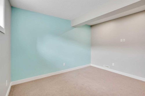 157 Rainbow Falls Boulevard, Chestermere, AB - Indoor Photo Showing Other Room